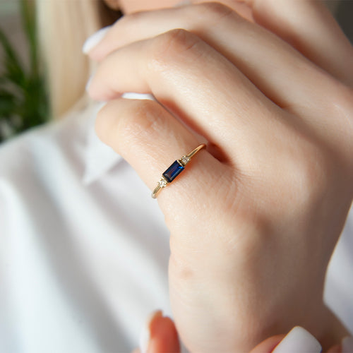 Baguette Sapphire Ring with Diamond Side Stones