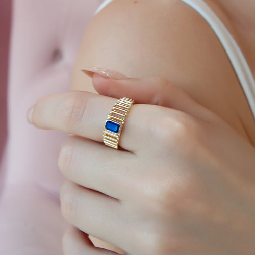 14K Gold Sapphire Ring with Rectangular Blue Gemstone and Unique Band Design