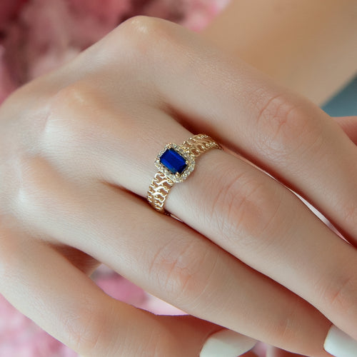 Stunning Gold Ring with Emerald Cut Blue Sapphire and Diamond Halo