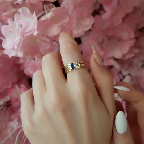 Elegant 14K Gold Ring with Emerald Cut Blue Sapphire and Diamond Accents