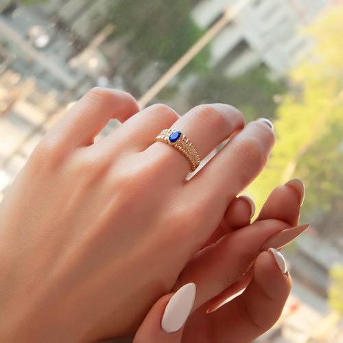 14K Gold Ring with Oval Blue Sapphire and Diamond Accents