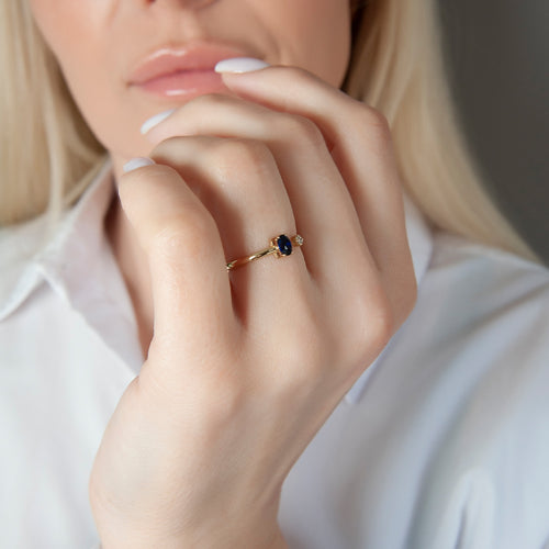 Minimalist 14K Gold Ring with Oval Blue Sapphire and Sparkling Diamond Accent
