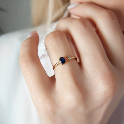 Minimalist 14K Gold Ring with Oval Blue Sapphire and Sparkling Diamond Accent