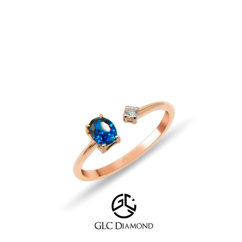 Minimalist 14K Gold Ring with Oval Blue Sapphire and Sparkling Diamond Accent