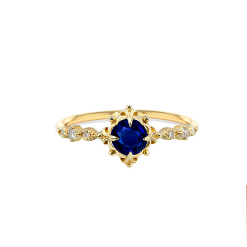 Exquisite Gold Ring with Round Blue Sapphire and Elegant Floral Design