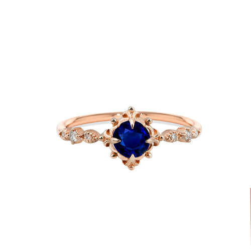 Exquisite Gold Ring with Round Blue Sapphire and Elegant Floral Design