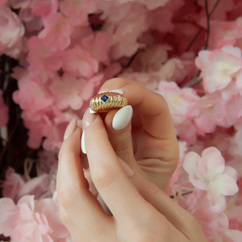 Elegant 14K Gold Ring with Blue Sapphire and Diamond Accents