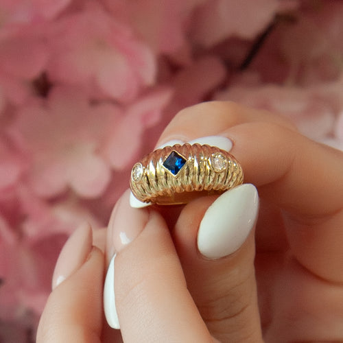 Elegant 14K Gold Ring with Blue Sapphire and Diamond Accents